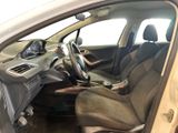 the interior of a car with the door open showing the steering wheel and dashboard