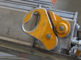 a close up of a machine that has a yellow lever on it