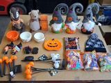 a table with a lot of halloween items on it