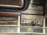 a close up of a label on the back of a bus