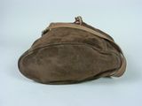 brown sued purse on white background with strap around it