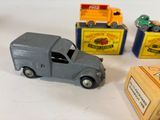 a toy truck and a box of cigarettes on a table