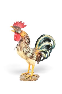 une figurine représentant un coq sur fond blanc