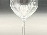 a wine glass with a picture of a woman on it