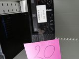 a computer on the shelf in the store with a price tag
