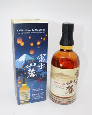 bottle of japanese whisky with box on white background with mountain in background