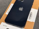 an apple iphone is sitting on top of a box on a table