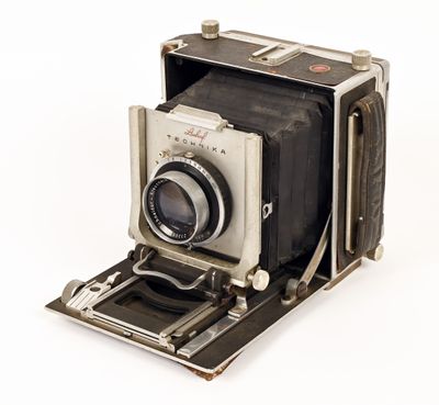 an old camera that is sitting on a table