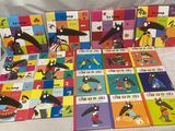de nombreux livres pour enfants posés ensemble sur le lit