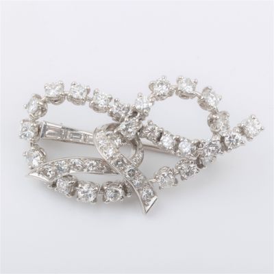 Broche "Nœud", diamants taille brillant et baguette, 3 carat… - Photo 1