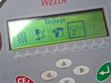 a close up of a machine with a clock on it