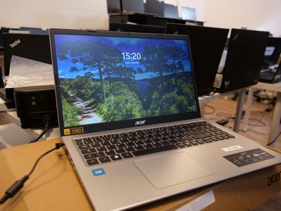 a laptop that is sitting on top of a box