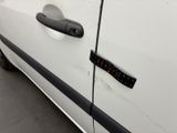 a close up of a car door handle with a sticker on it