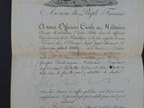 un vieux document sur lequel figure le dessin d'un homme dans un bateau