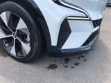 a close up view of a car ' s front wheel