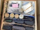 a box with a train set in it on a table