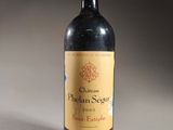 a bottle of wine that is sitting on a table