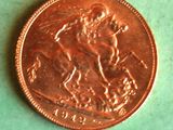 a penny on a table with a green background