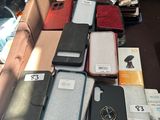 many cell phones that are sitting on a table