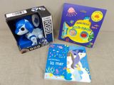 two books and a stuffed animal in a box