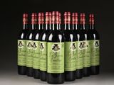 six bottles of red wine are lined up in a row