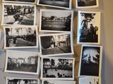 several black and white photos are hanging on the wall of a room