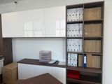 a desk with a bunch of boxes on top of it
