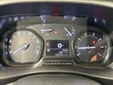 a close up of a car dashboard with various gauges