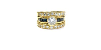 an image of a diamond and sapphire ring set on a white background