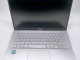 an image of a laptop computer sitting on top of a white table