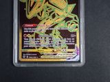 a close up of a pokemon card on a table