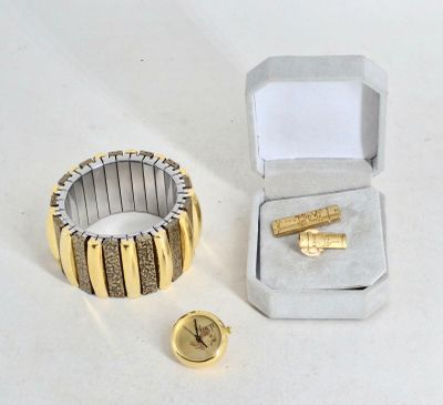 Lot comprenant 1 Bracelet extensible en métal doré et argent…