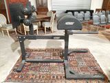 a machine that is sitting on a rug in a room