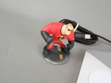 a small figurine of the incredible spider - man on a desk