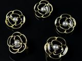 a set of five gold and pearl flower brooches