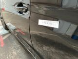 a car that has a sticker on the side of it