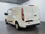 a white van that is parked in a room