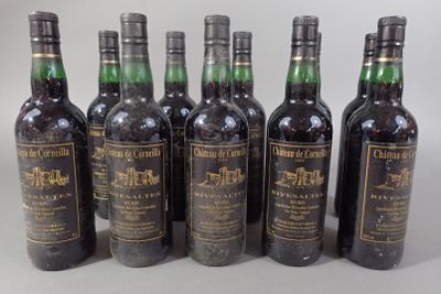 six bottles of wine are lined up in a row on a table