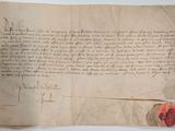 un gros plan d'un morceau de papier sur lequel on a écrit