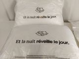 a pillow on the bed with a pillow case on top of it