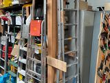 a ladder that is leaning against a wall in a garage