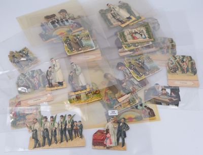 a lot of miniature figurines of people in plastic bags