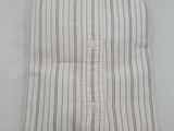 a close up of a white shirt with a blue tag on it