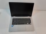 a laptop computer that is sitting on a table