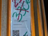 a sign that is attached to the side of a building