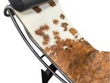 leather chaise lounger with cow hide hide
