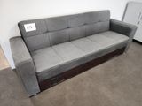 a couch that is sitting in the corner of a room