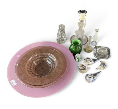 a pink plate with a bowl and silverware on it