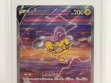 un gros plan d'une carte Pokémon sur fond blanc