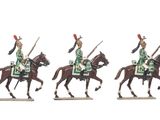 three figurines of men in uniforms riding on horses